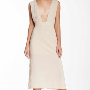 Low neckline nude dress